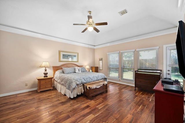 bedroom featuring ornamental molding, dark hardwood / wood-style floors, and ceiling fan