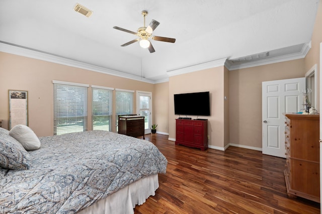 bedroom with dark wood-type flooring, ornamental molding, ceiling fan, and vaulted ceiling