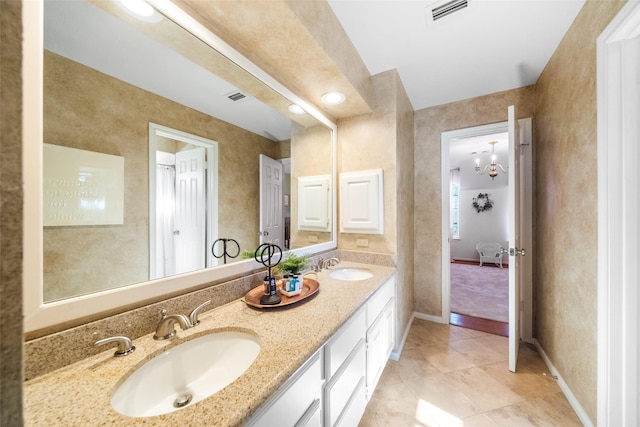 bathroom with vanity and tile patterned floors