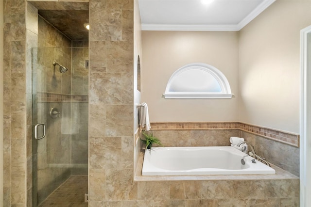 bathroom with crown molding and shower with separate bathtub