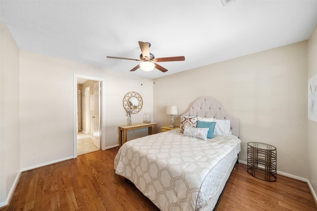 bedroom featuring wood-type flooring and ceiling fan