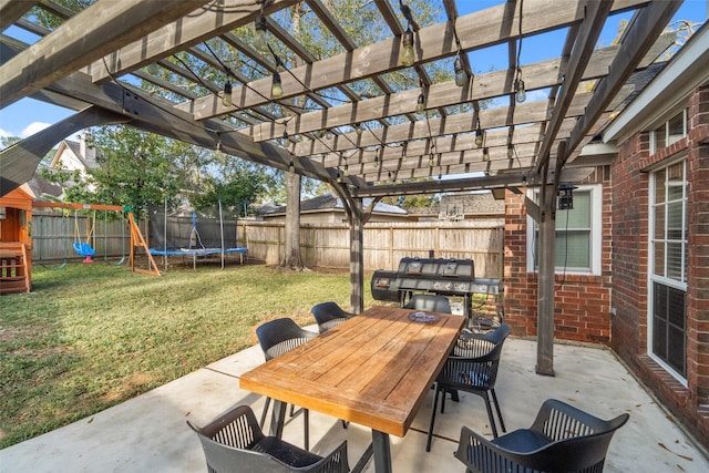 view of patio / terrace with a trampoline, a pergola, and a playground