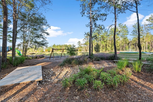 surrounding community featuring a playground