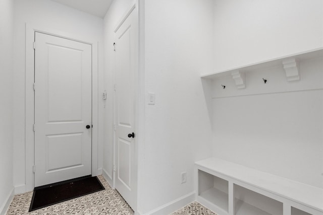 mudroom with light tile patterned flooring