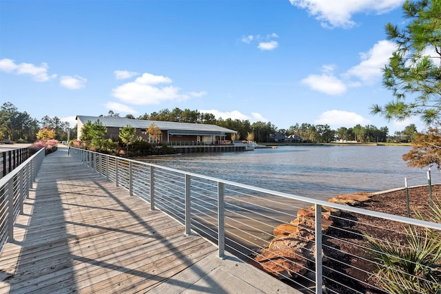 view of dock with a water view