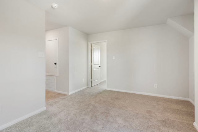 bonus room with light carpet