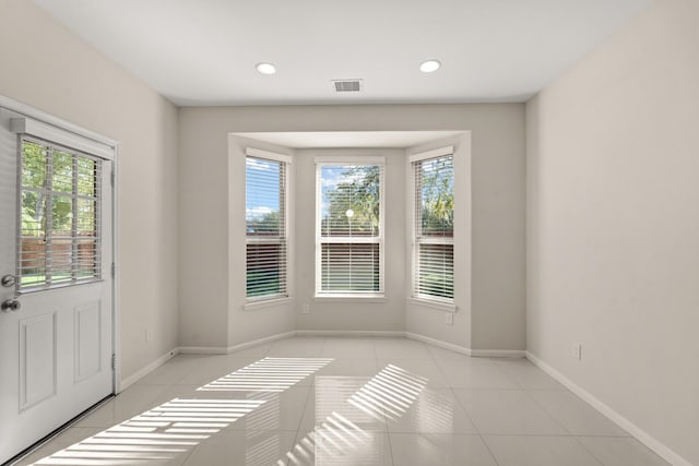 interior space with light tile patterned flooring