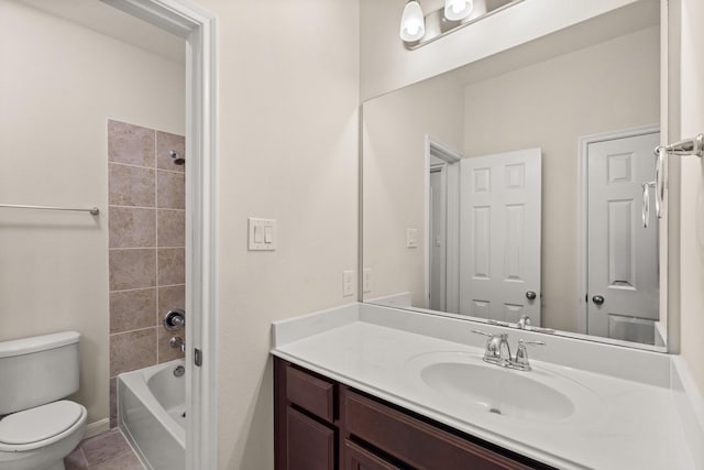 full bathroom featuring toilet, tile patterned flooring, bathtub / shower combination, and vanity