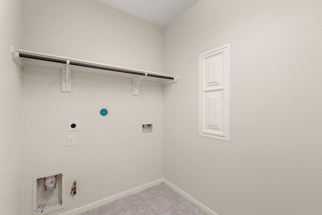 clothes washing area featuring gas dryer hookup, hookup for a washing machine, hookup for an electric dryer, and light tile patterned floors