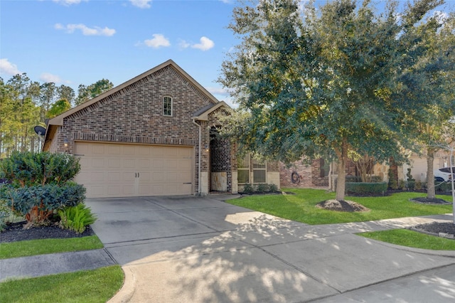 view of front of home with a garage and a front lawn