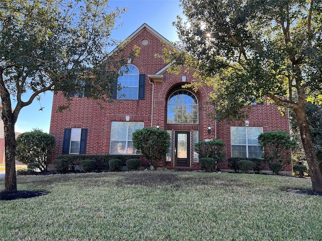 front of property featuring a front lawn