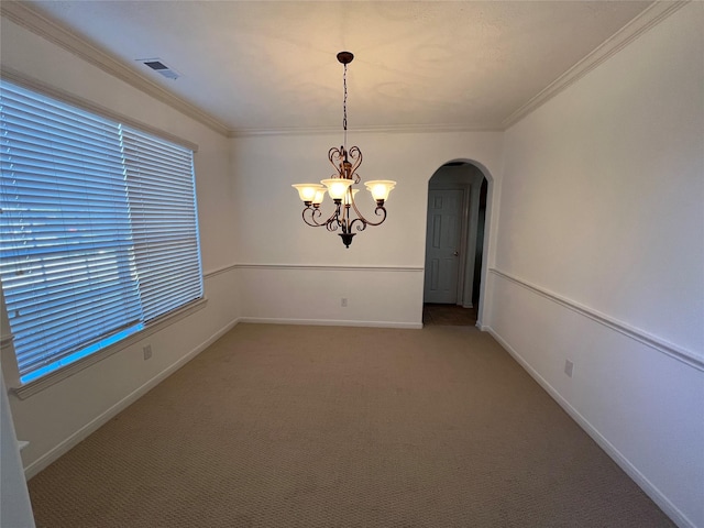 6731 Pinetop Glen Ln, Spring, TX 77379 - unfurnished room with light carpet, crown molding, arched walkways, a chandelier, and baseboards