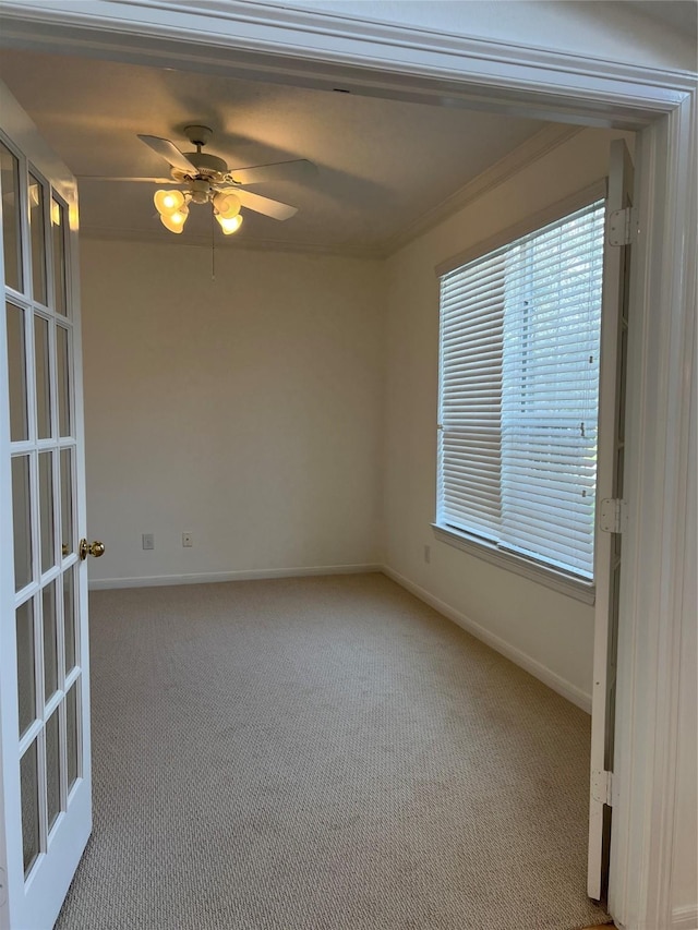 6731 Pinetop Glen Ln, Spring, TX 77379 - spare room featuring carpet, baseboards, ceiling fan, and french doors