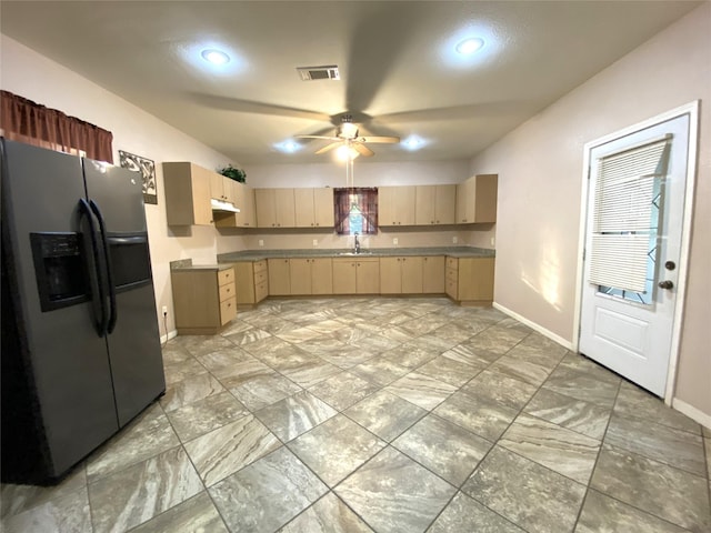 kitchen with ceiling fan, sink, light brown cabinets, and stainless steel fridge with ice dispenser