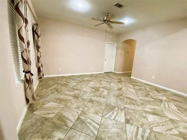 spare room with ceiling fan