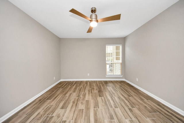 empty room with light hardwood / wood-style floors and ceiling fan