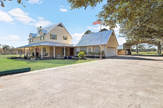 view of front facade featuring a garage, a front lawn, a porch, and a carport