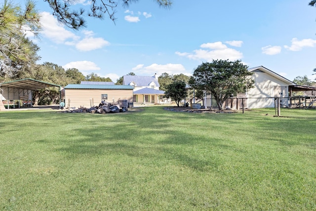 view of yard with a carport