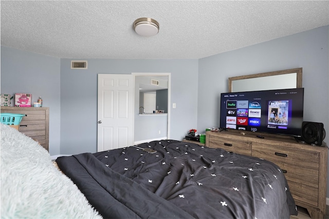 bedroom with a textured ceiling