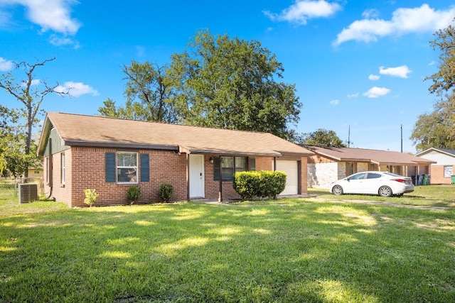 single story home featuring a garage, central air condition unit, and a front lawn