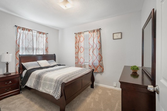 bedroom with light carpet