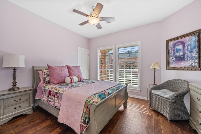 bedroom featuring dark hardwood / wood-style floors and ceiling fan