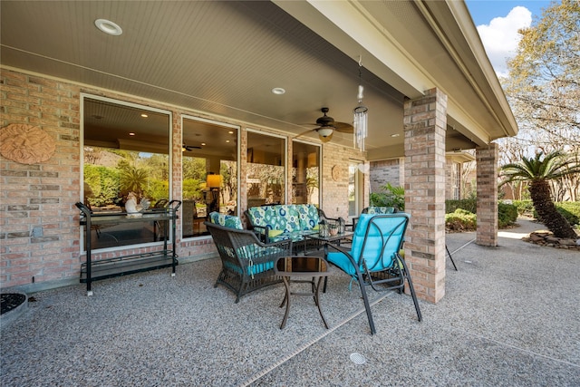 view of patio / terrace featuring ceiling fan and outdoor lounge area