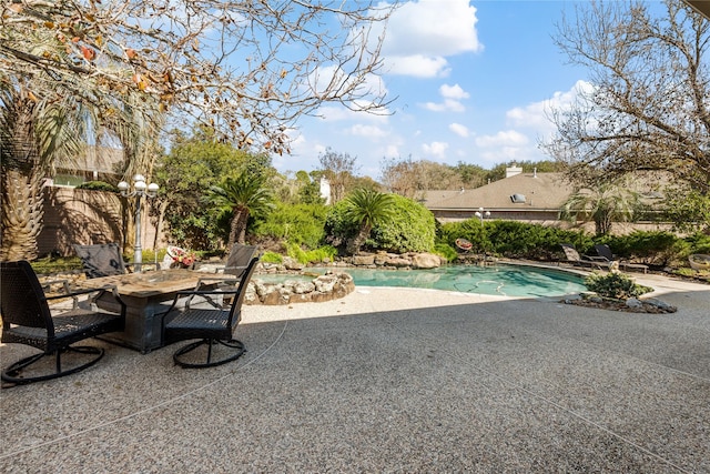 view of swimming pool featuring a patio