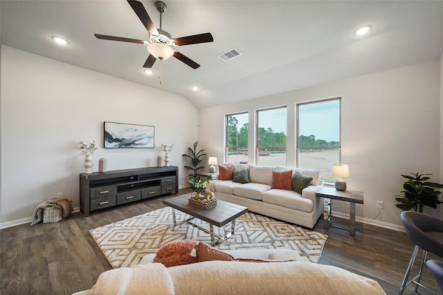 living room with ceiling fan, dark hardwood / wood-style flooring, and lofted ceiling