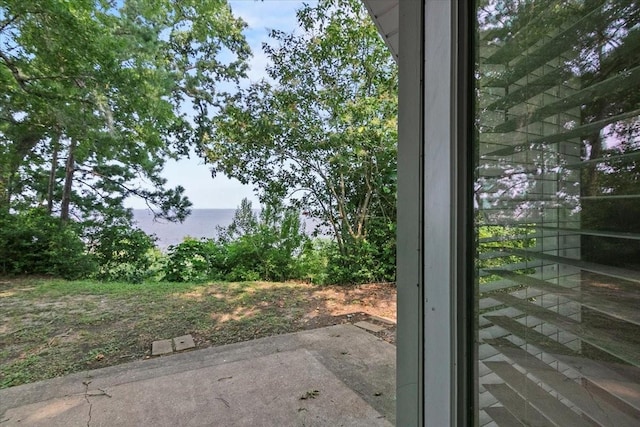 view of patio / terrace featuring a water view