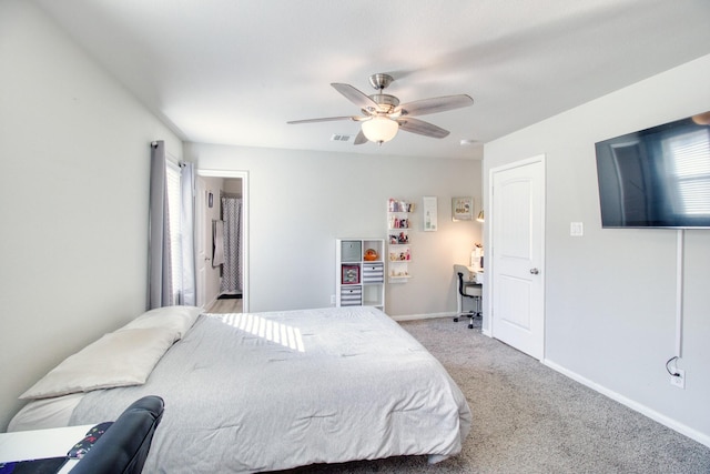 carpeted bedroom with ceiling fan