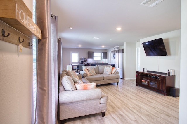 living room featuring light hardwood / wood-style floors