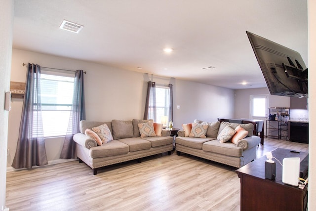 living room featuring light wood-type flooring