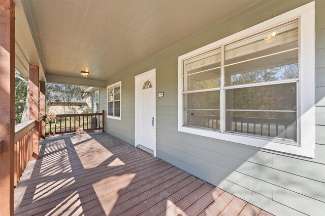 wooden deck featuring a porch