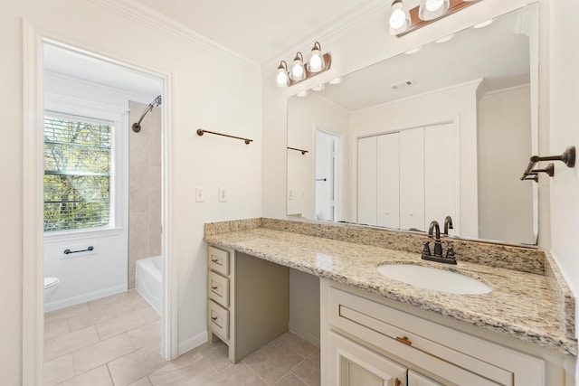 bathroom featuring toilet, vanity, baseboards, visible vents, and crown molding