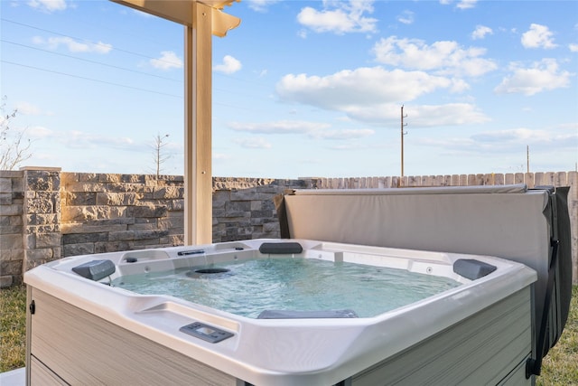 view of patio / terrace featuring a hot tub