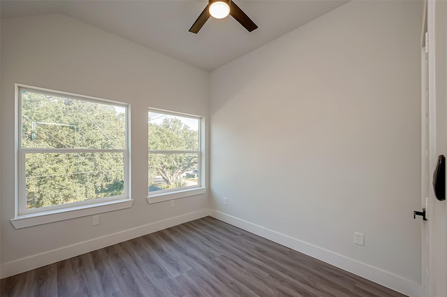 spare room featuring hardwood / wood-style flooring, ceiling fan, and vaulted ceiling