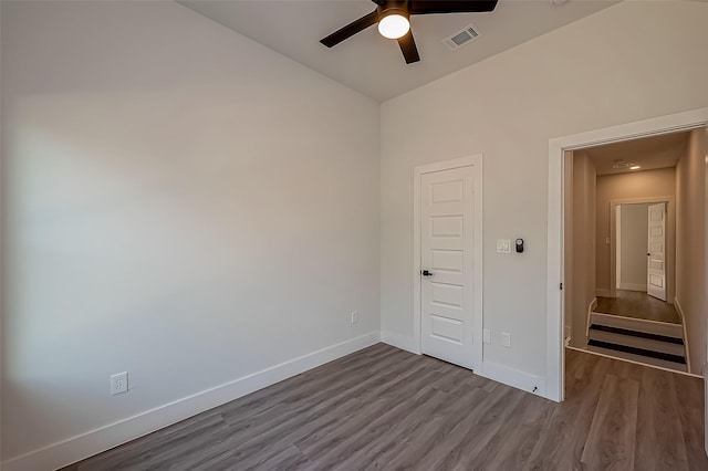 unfurnished bedroom with ceiling fan and light hardwood / wood-style floors