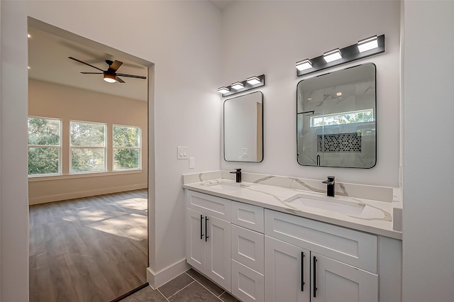 bathroom featuring vanity, ceiling fan, and tile patterned floors