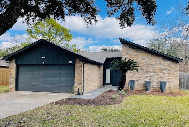 ranch-style home featuring a garage and a front yard