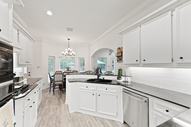 kitchen with sink, white cabinetry, and appliances with stainless steel finishes