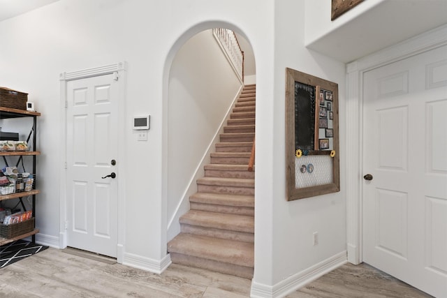 entryway with light hardwood / wood-style flooring