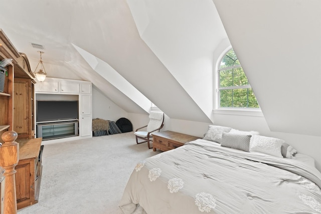 bedroom with light carpet and lofted ceiling