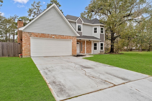 front of property featuring a garage and a front lawn