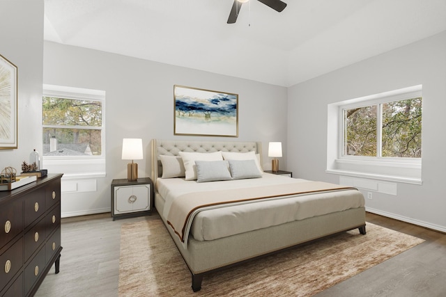 bedroom featuring ceiling fan and hardwood / wood-style flooring