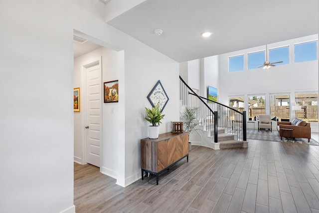 interior space featuring ceiling fan and light hardwood / wood-style flooring