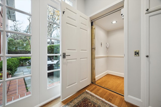 doorway featuring hardwood / wood-style floors