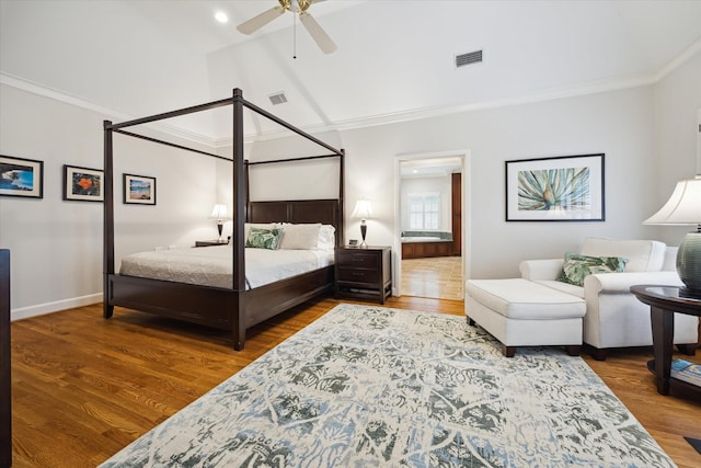 bedroom with ceiling fan, hardwood / wood-style flooring, and crown molding