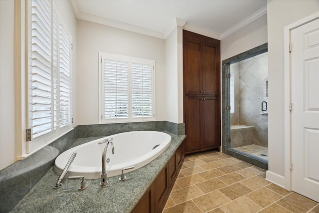 bathroom with independent shower and bath and crown molding