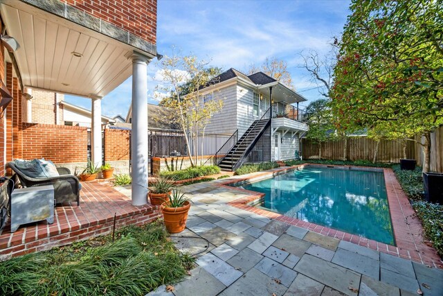 view of pool with a patio